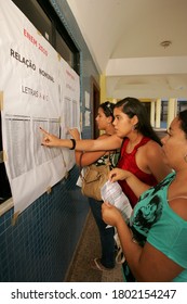 Eunapolis, Bahia / Brazil - November 6, 2010: People Look At Attendance List For Exams Of The National High School Exam - Enem - In The City Of Eunapolis.