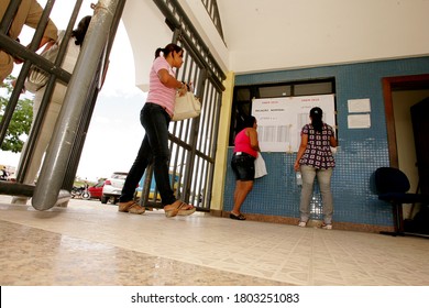 Eunapolis, Bahia / Brazil - November 6, 2010: People Look At Attendance List For Exams Of The National High School Exam - Enem - In The City Of Eunapolis.