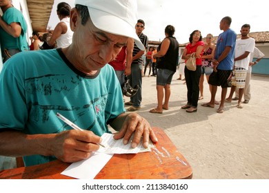 eunapolis, bahia, brazil - october 3, 2010: electories queue to vote during elections in the city of Eunapolis.