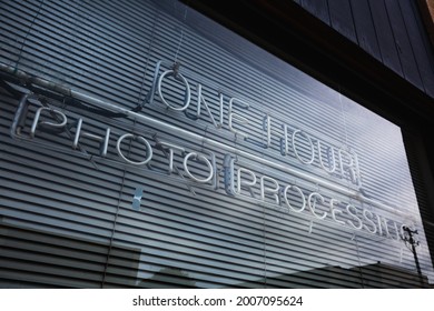 Eureka, CA - October 21 2019: An Unlit Neon Sign For One Hour Photo Processing. 