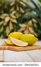 Eureka Lemon On Wooden Table Background.