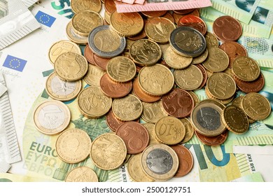 euro banknotes and coins, money background, different euro denominations, money texture, european currency, - Powered by Shutterstock