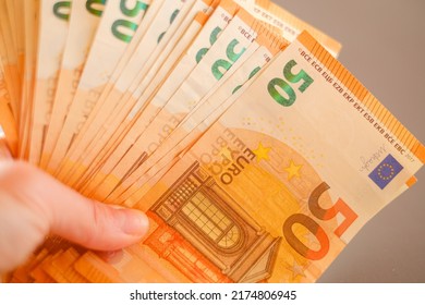 Euro Banknotes In Hand.Expenses And Incomes In European Countries.Euro Currency Exchange Rate.Budget Allocation. Euro Currency.