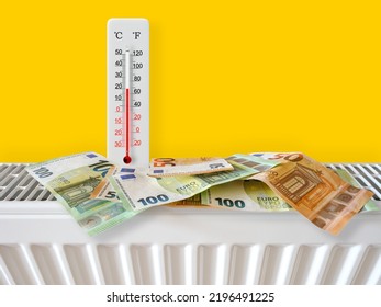 Euro Banknotes On Home Heating Radiator With Thermometer. Energy Crisis And Expensive Heating Costs For Winter Season. Big Heating, Electricity And Gas Bill. Thermometer Shows Plus 20 Degrees Warm