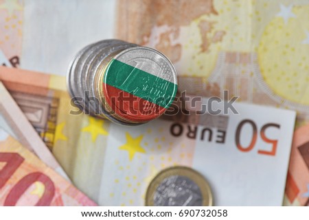 euro coin with national flag of bulgaria on the euro money banknotes background. finance concept