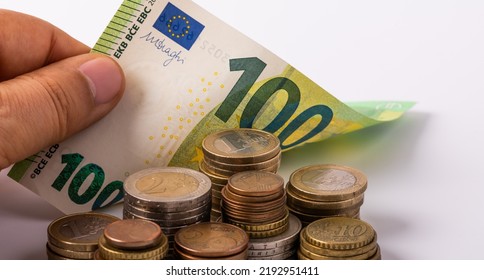 Euro Coins And 100 Euro Banknote