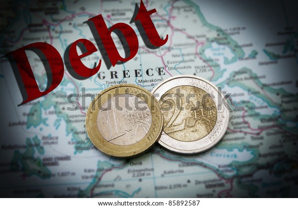 Euro coins on a map of Greece with Debt text\
(Greek financial crisis)