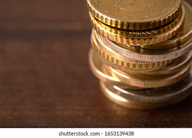 Euro coins stacked on each other in different positions