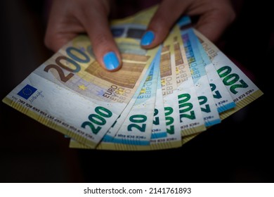 Euro Currency, Woman Hand Holds Some Paper Euro Money Currency.