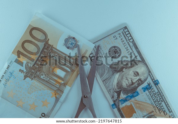 Euro Dollar\
Conflicts, banknote Dollar and banknote Euro, Euro vs Dollar a\
scissors divided, Economic\
crisis