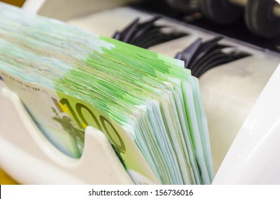 Euro (EUR) Banknotes Of 100 On Money Counter Machine - Legal Tender Of The European Union