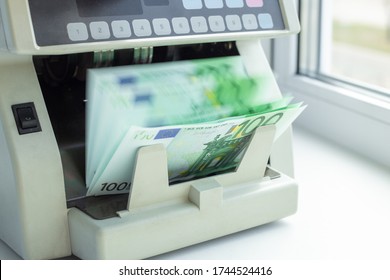 Euro EUR Banknotes Of 100 On Money Counter Machine. Automatic Money Counting In The Machine - Image