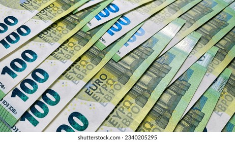 Euro money background. Single currency of the European Union. Banknotes of 100 euros. Background of cash one hundred euro bills. European currency. Cash banknotes. Financial background concept. - Shutterstock ID 2340205295