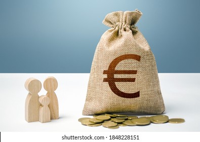 Euro Money Bag With Money And Family Figurines. Financial Support For Social Institutions. Investments In Human Capital, Culture And Social Projects. Providing Assistance To Citizens.