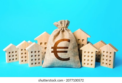 Euro money bag and residential buildings. Municipal budgeting. Rich city. Rental business. Realtor services. Sale of real estate. property taxes. Tax collection, investment in city development.