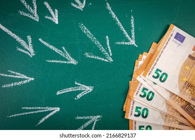 Euro Money On A Green Chalkboard. Follow Money Concept.