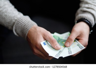 Euro Money. paper Euro banknotes in man hand.