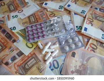 Euro Money And Pills On The Table. Treating The Virus. Covid-19 Medicine. Therapy. Chemotherapy.