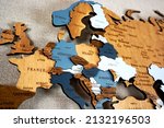 Europa on the political map. Wooden world map on the wall. Ukraine, Belarus, Poland and other countries