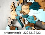 Europa on the political map. Wooden world map on the wall. Germany, Poland, Romania, Ukraine, Serbia, Hungary, Austria, Slovakia and other countries 