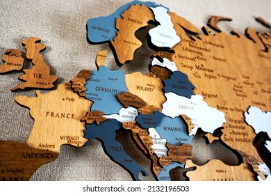 Europa on the political map. Wooden world map on the wall. Ukraine, Belarus, Poland and other countries - Shutterstock ID 2132196503