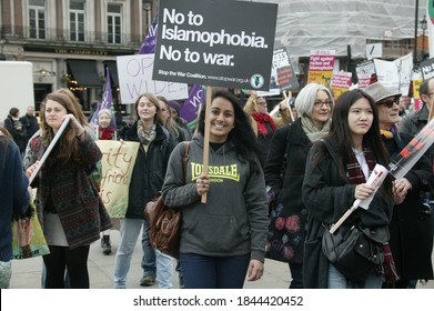 Europe- 25.10.2020: the protest against ( no to islamophobia and no to war ) A girl has a banner in the hand with crowed 