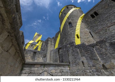 Europe France, Carcassonne,  05-2018 : , To celebrate the 20 years of its classification at UNESCO, The French town of Carcassonne covered the walls of it’s medieval city with circles of yellow .
