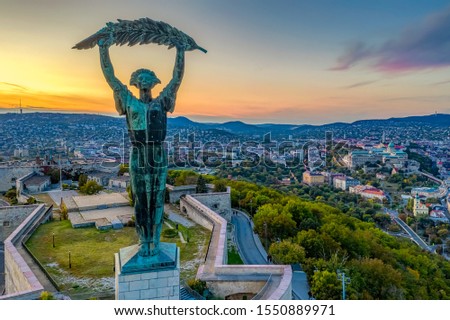 Europe Hungary BUdapest Citadella. Liberty statue. Budapest cityscapes form Gellert Hill. Buda castle in the background. 
