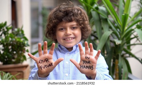 Europe, Italy - 7 Year Old Boy Child  Environmentalist With Written On His Hands Our Future Is In Your Hands - Environmentalist Protest Against Cmilmatic Changes And Global Warming - Youth For Future