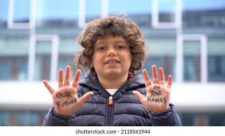 Europe, Italy - 7 Year Old Boy Child  Environmentalist With Written On His Hands Our Future Is In Your Hands - Environmentalist Protest Against Cmilmatic Changes And Global Warming - Youth For Future