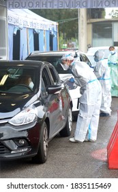 Europe, Italy , Milan October 2020, People Are Tested At A Drive Thru, Coronavirus Pandemic, Covid-19. Blood Test And Swab Nasal Test During Quarantine Home Lockdown In San Carlo Hospital, People Mask