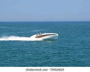 Europe. Mediterranean sea. Italy country.
Adriatic sea near Sanno city. Summer 2015. Modern motor yacht movie.Motor yacht running along the blue sea along the shore. Exclusive recreation on the water 