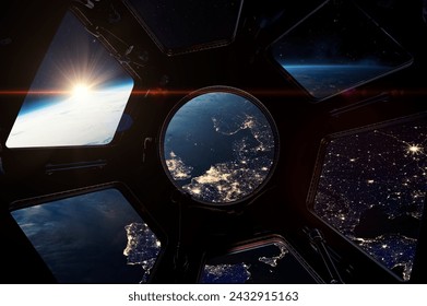 Europe at night. View on night Earth from porthole on space station. ISS window. International space station and Earth planet with stars view. Elements of this image furnished by NASA. - Powered by Shutterstock