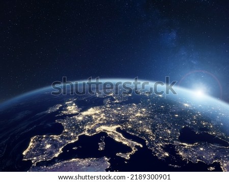Europe at night viewed from space with city lights showing activity in European Union countries. 3d render of planet Earth. Elements from NASA. Technology, global communication, world.