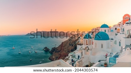 Europe summer destination. Traveling concept, sunset scenic famous landscape of Santorini island, Oia, Greece. Caldera view, colorful clouds, dream cityscape. Vacation panorama, amazing outdoor scene