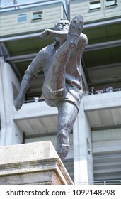 Europe UK London Twickenham Rugby Ground 2007. Male Bronze Statue Of Rugby Player Kicking The Ball. 