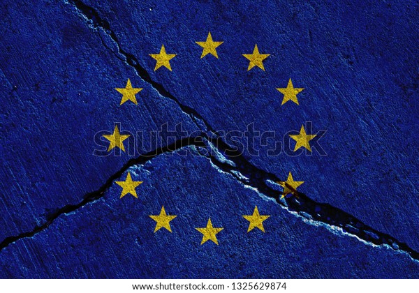 europe\
union flags painted over cracked concrete\
wall