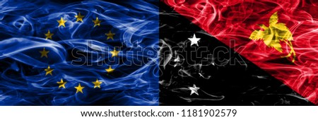 Europe Union and Papua New Guinea colorful concept smoke flags placed side by side