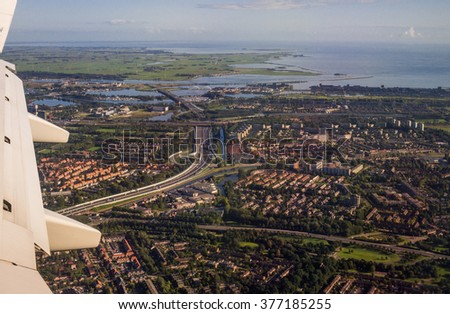 European Capital City Amsterdam Aerial View from Jet Aircraft Porthole