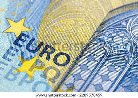 European cash banknotes with a face value of 20 euros close-up , details of a twenty euro blue paper bill