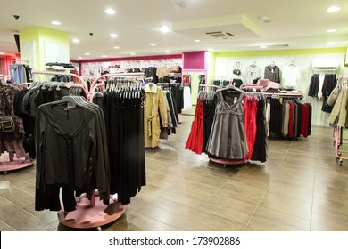 european clothing store interior in modern mall - Shutterstock ID 173902886