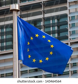 European Flag In Front Of The Berlaymont Building, Headquarters Of The European Commission In Brussels.