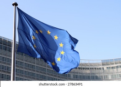 European flags floating in front of the European Commission Building in Brussels - Shutterstock ID 27863491