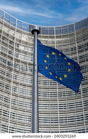 European flags in front of headquarters of European commission in Brussels in summer day