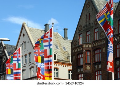 European Flags In Front Of Old Hansa Houses In Bergen, Norway