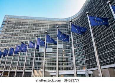 European flags on the background of the European Parliament