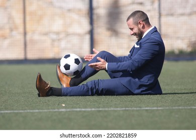 European Football Championship Concept. Businessman Playing Soccer Ball.