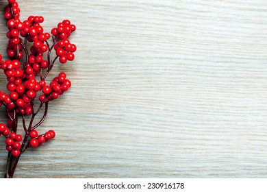 european holly on a wooden surface - Powered by Shutterstock