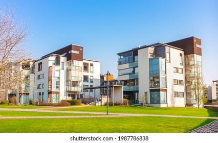 European residential complex of apartment buildings. Outdoor facilities. Eco-friendly living in city. Modern block of flats. Scandinavian architecture. Courtyard, green lawn Lifestyle Helsinki Finland