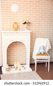 European scenery Studio fireplace by the wall, a vase with flowers, a toy on the chair, winter decorations, Christmas home decorations, light candles, lantern